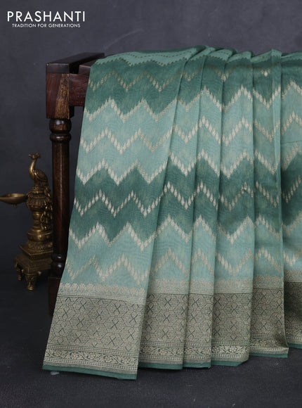 Banarasi silk cotton saree pastel green and green with allover zari weaves and zari woven border