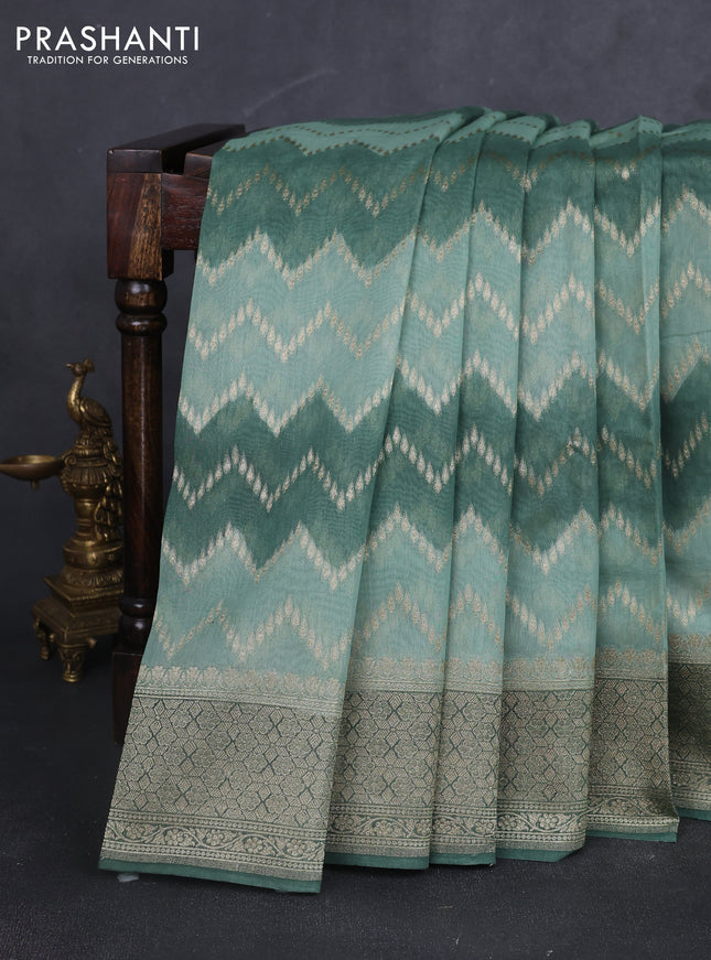 Banarasi silk cotton saree pastel green and green with allover zari weaves and zari woven border
