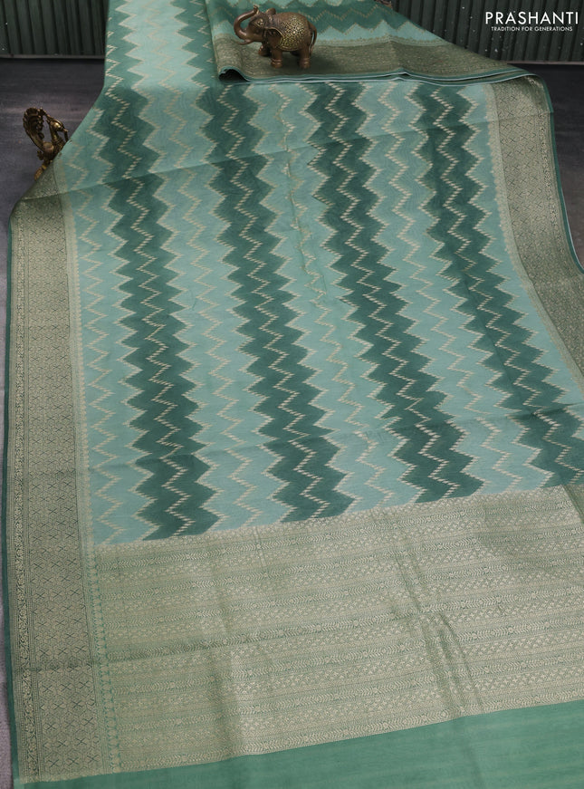 Banarasi silk cotton saree pastel green and green with allover zari weaves and zari woven border