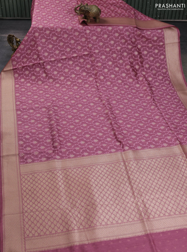 Banarasi silk cotton saree mauve pink with allover thread weaves & zari woven buttas and zari woven border