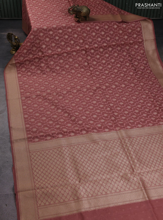 Banarasi silk cotton saree peach shade with allover thread weaves & zari woven buttas and zari woven border
