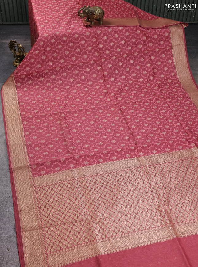 Banarasi silk cotton saree peach pink with allover thread weaves & zari woven buttas and zari woven border