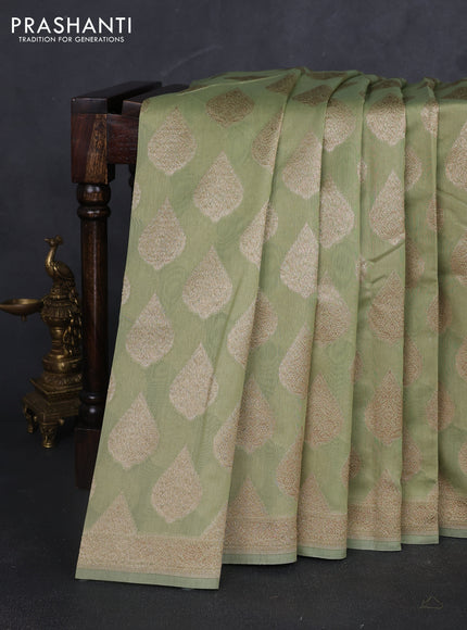 Banarasi silk cotton saree pista green with allover thread & zari woven buttas and woven border