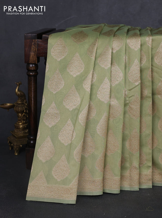 Banarasi silk cotton saree pista green with allover thread & zari woven buttas and woven border