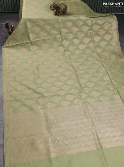 Banarasi silk cotton saree pista green with allover thread & zari woven buttas and woven border