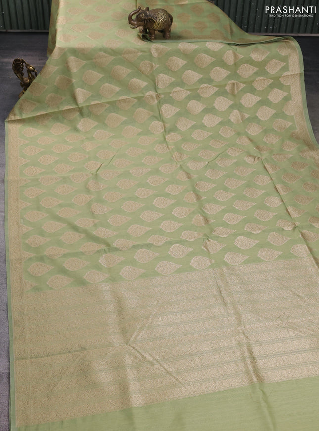 Banarasi silk cotton saree pista green with allover thread & zari woven buttas and woven border