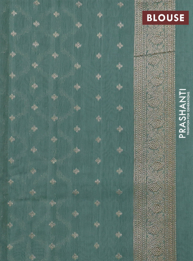 Banarasi silk cotton saree pastel green with allover zari weaves and zari woven border