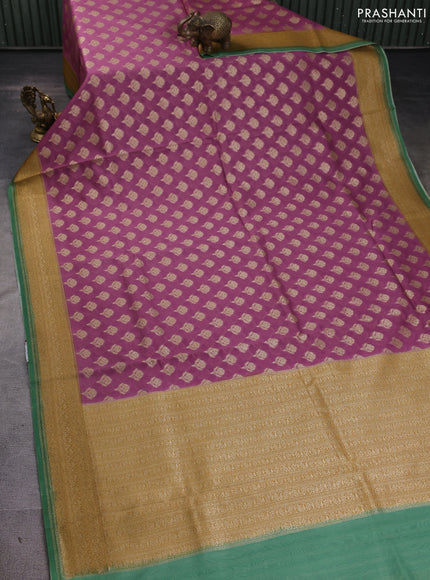 Banarasi silk cotton saree mauve pink and green with allover thread & zari woven buttas and woven border