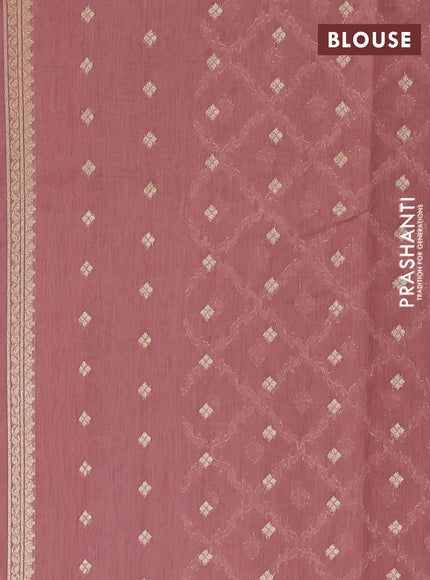 Banarasi silk cotton saree peach shade with allover zari woven buttas and zari woven border