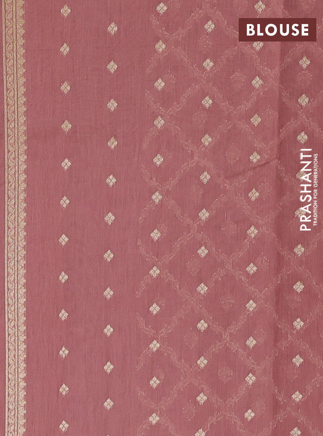 Banarasi silk cotton saree peach shade with allover zari woven buttas and zari woven border