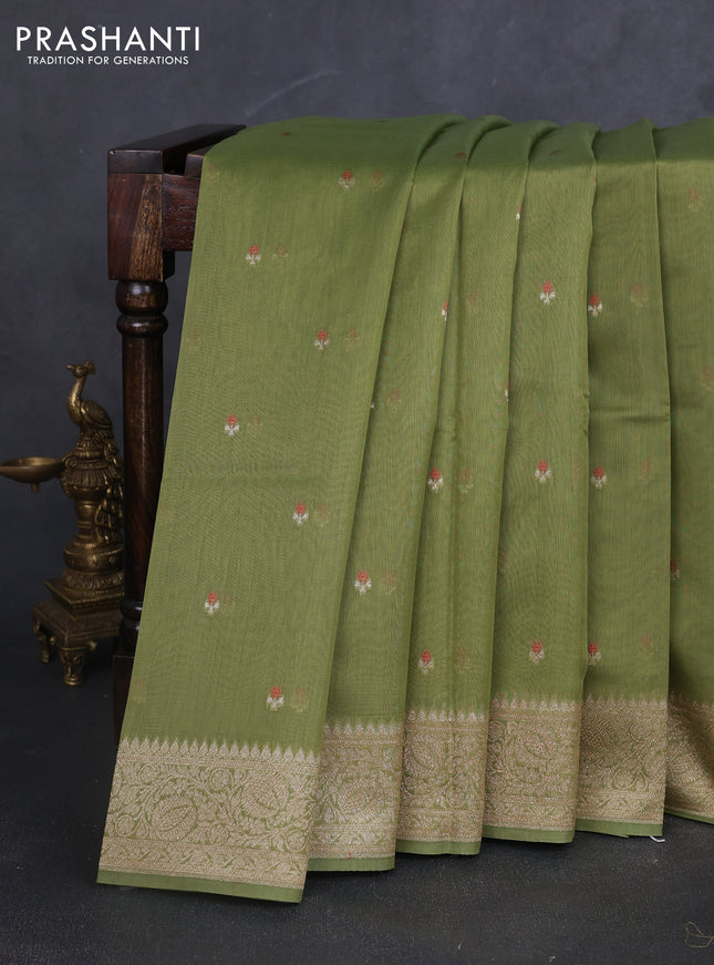 Banarasi silk cotton saree pastel green with allover zari woven buttas and zari woven border