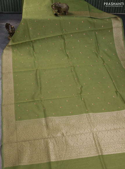 Banarasi silk cotton saree pastel green with allover zari woven buttas and zari woven border
