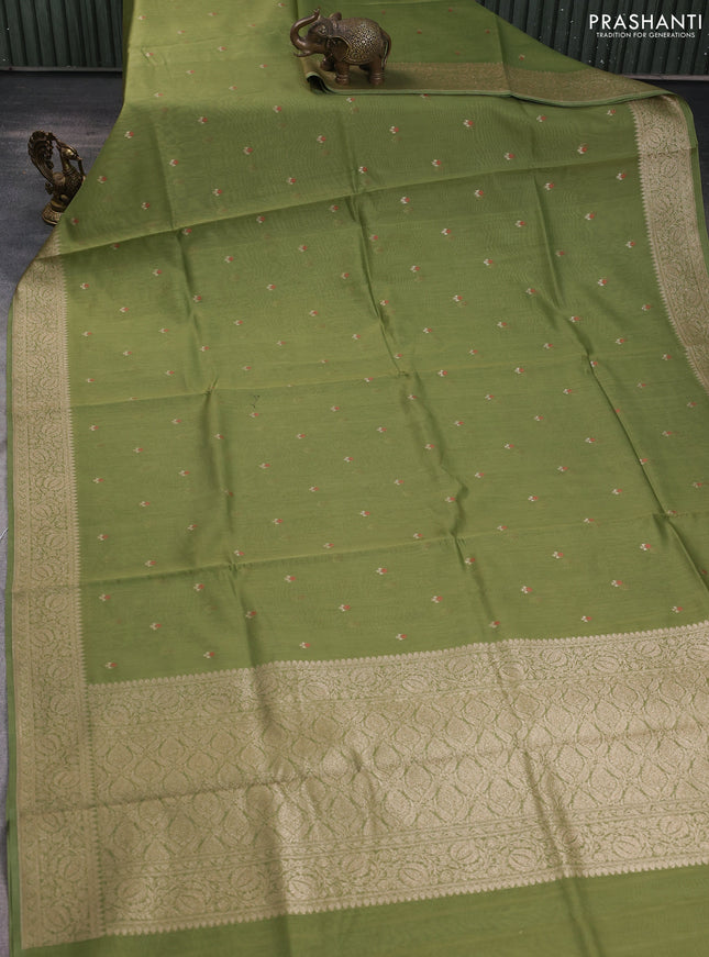 Banarasi silk cotton saree pastel green with allover zari woven buttas and zari woven border
