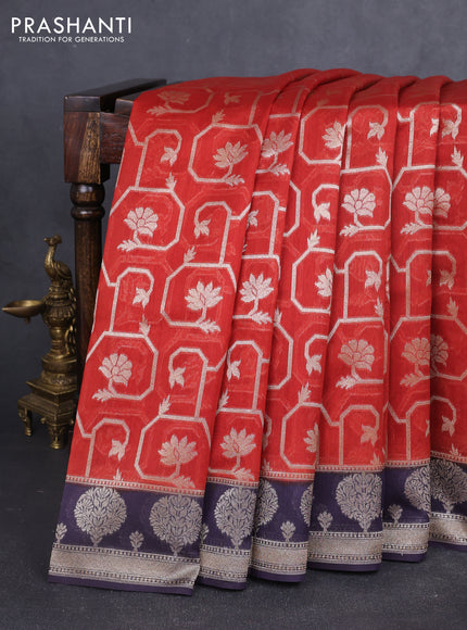 Banarasi silk cotton saree rustic orange and deep jamun with allover zari weaves and zari woven butta border