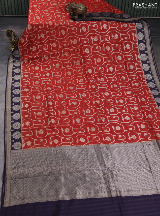 Banarasi silk cotton saree rustic orange and deep jamun with allover zari weaves and zari woven butta border