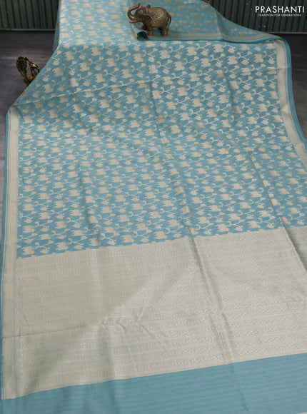 Banarasi silk cotton saree pastel blue with allover pichwai zari woven butta weaves and zari woven border