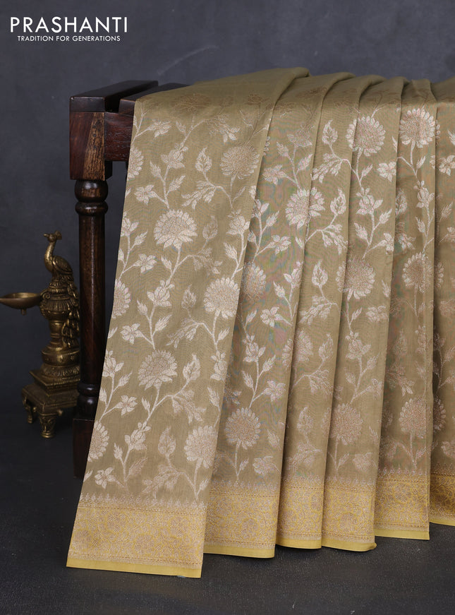 Banarasi silk cotton saree beige and yellow with allover zari woven buttas and zari woven border
