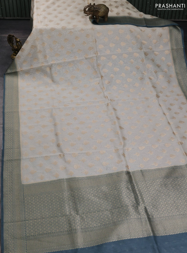 Banarasi silk cotton saree cream and bluish grey with allover zari woven buttas and zari woven border