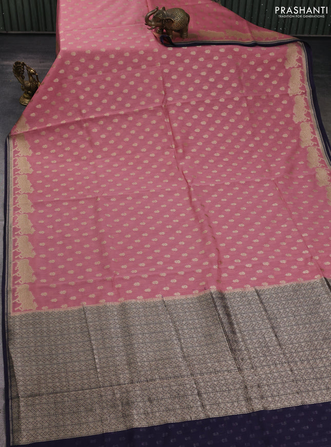 Banarasi silk cotton saree peach pink and navy blue with allover zari woven buttas and pichwai zari woven border