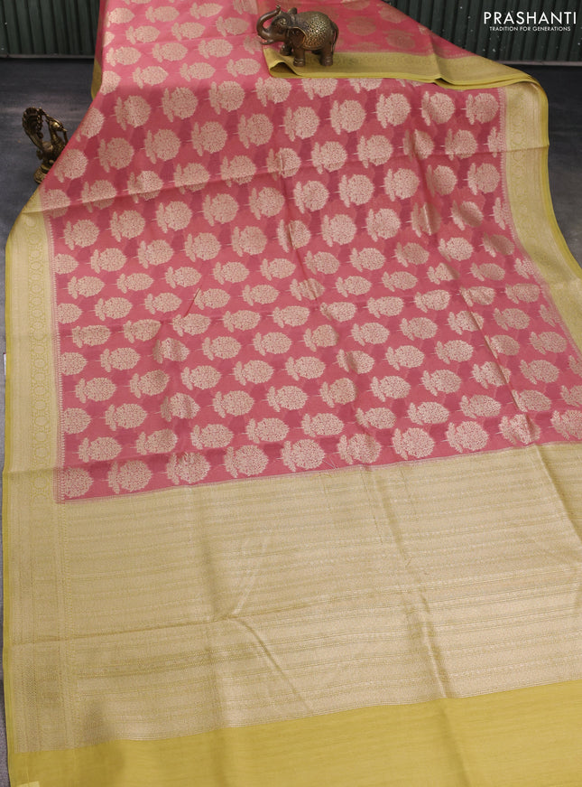 Banarasi silk cotton saree peach pink and pale yellow with allover zari woven buttas and zari woven border