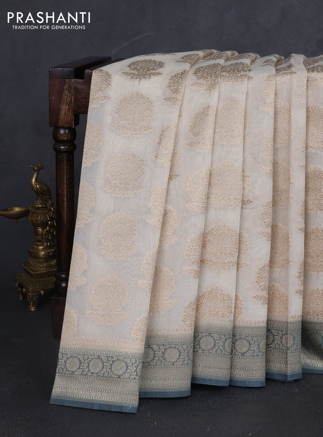 Banarasi silk cotton saree cream and grey with allover zari woven buttas and zari woven border