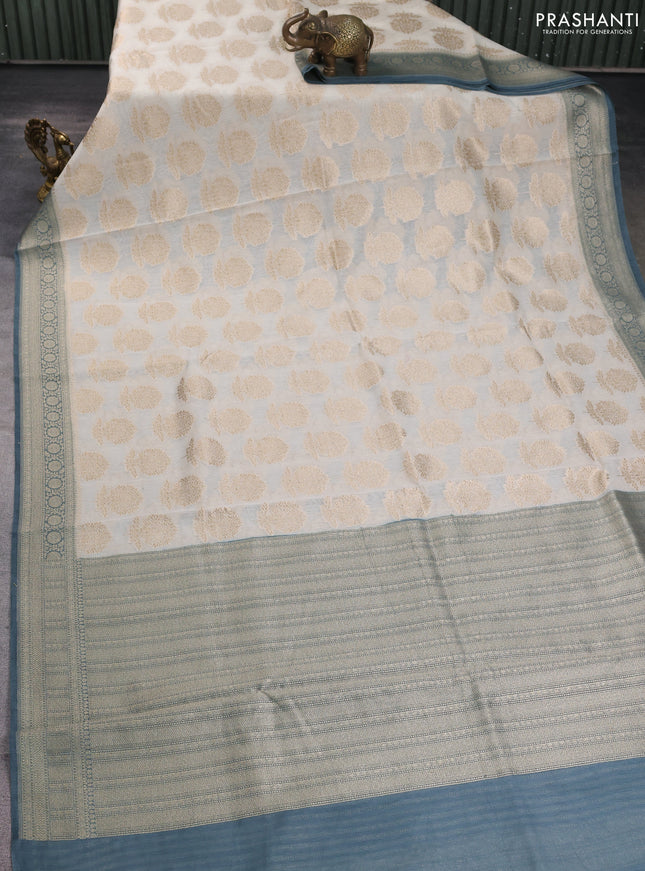 Banarasi silk cotton saree cream and grey with allover zari woven buttas and zari woven border
