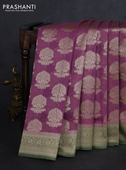 Banarasi silk cotton saree mauve pink and light green with allover zari woven buttas and zari woven border