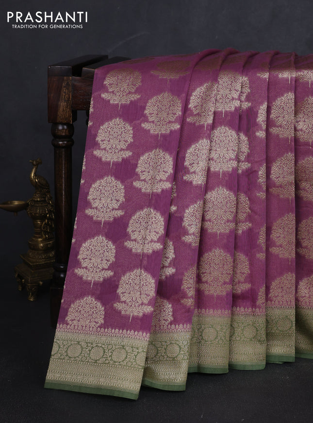 Banarasi silk cotton saree mauve pink and light green with allover zari woven buttas and zari woven border