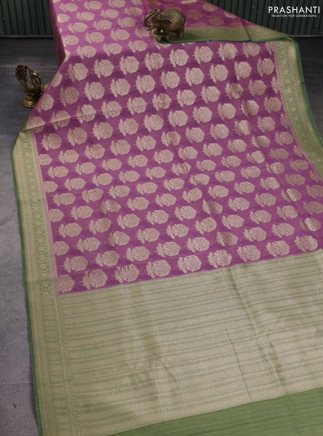 Banarasi silk cotton saree mauve pink and light green with allover zari woven buttas and zari woven border