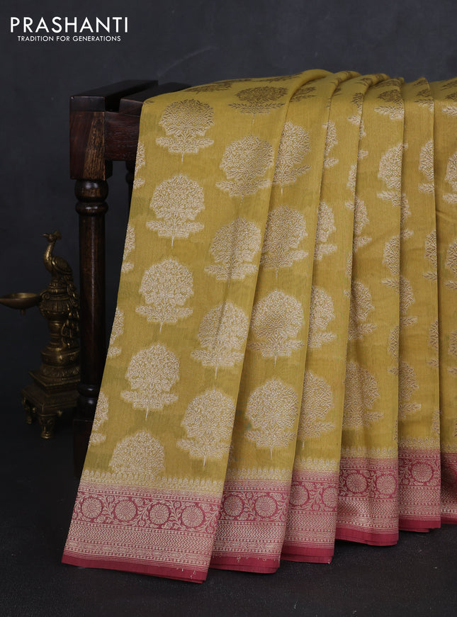 Banarasi silk cotton saree pale yellow and pastel maroon with allover zari woven buttas and zari woven border