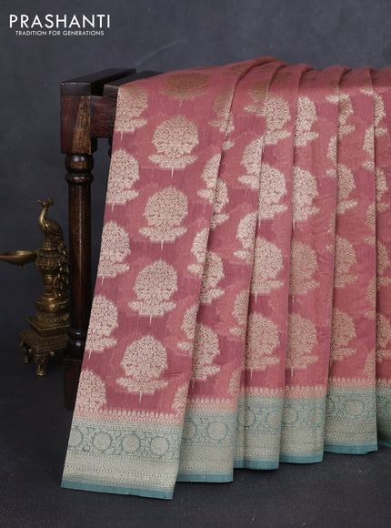 Banarasi silk cotton saree peach shade and pastel green with allover zari woven buttas and zari woven border