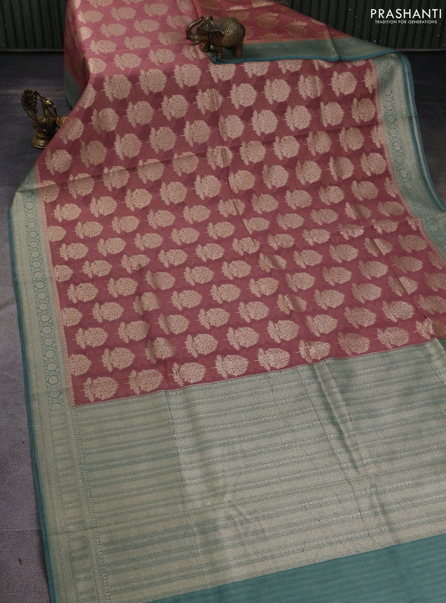 Banarasi silk cotton saree peach shade and pastel green with allover zari woven buttas and zari woven border