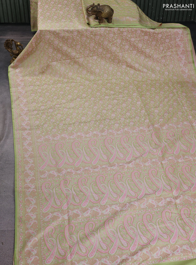 Banarasi semi katan silk saree mild pista green and light pink with allover thread woven brocade weaves and thread woven border