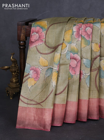 Pure tussar silk saree pastel green and peach piink with allover hand painted prints and zari woven border