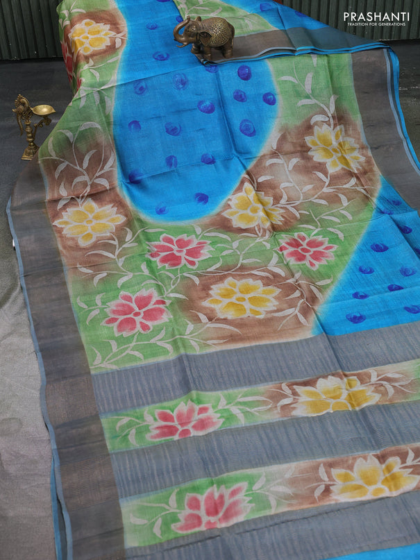 Pure tussar silk saree multi colour and bluish grey with allover hand painted prints and zari woven border