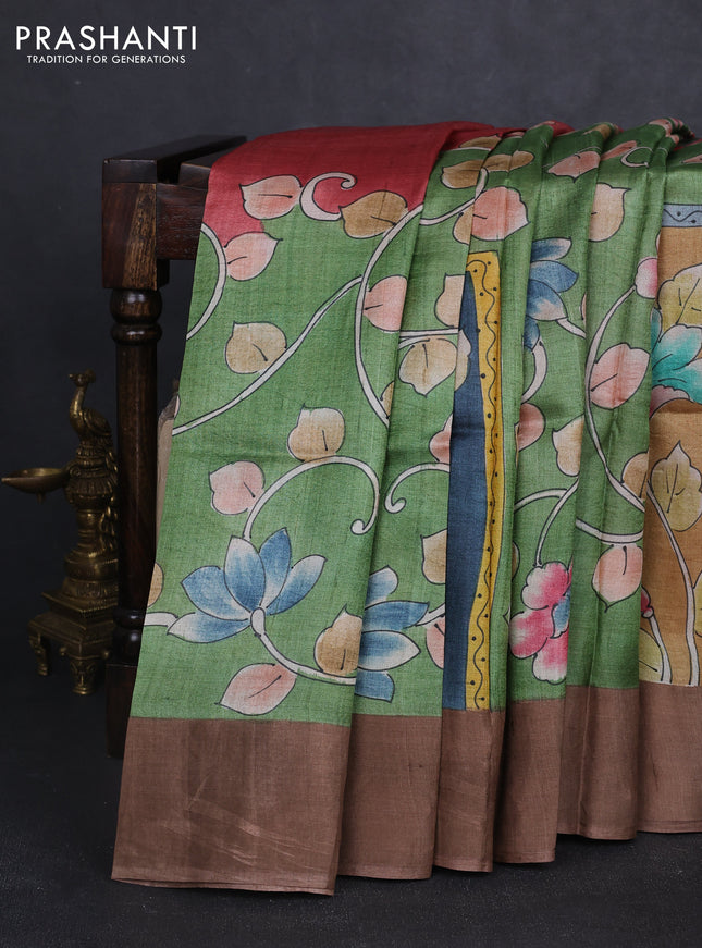 Pure tussar silk saree pastel green and dark sandal with allover kalamkari hand painted prints and zari woven border