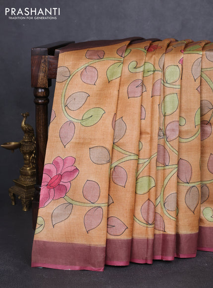 Pure tussar silk saree sandal and mauve pink with allover hand painted prints and zari woven border
