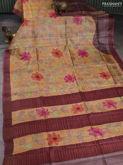 Pure tussar silk saree sandal and mauve pink with allover hand painted prints and zari woven border