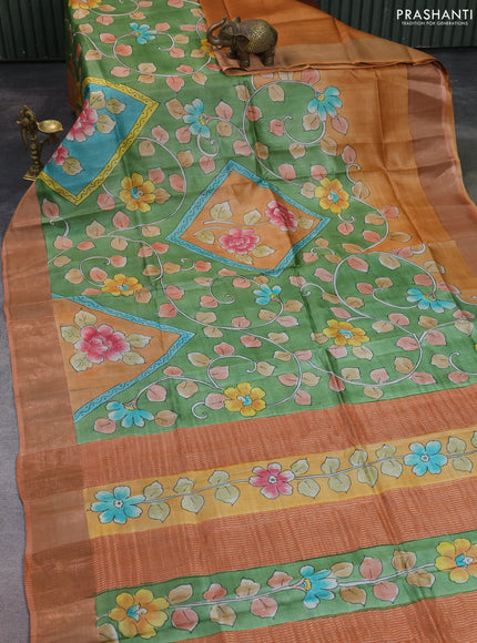 Pure tussar silk saree pastel green and peach shade with allover hand painted prints and zari woven border