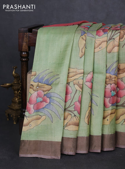 Pure tussar silk saree pista green and brown with allover hand painted prints and zari woven border
