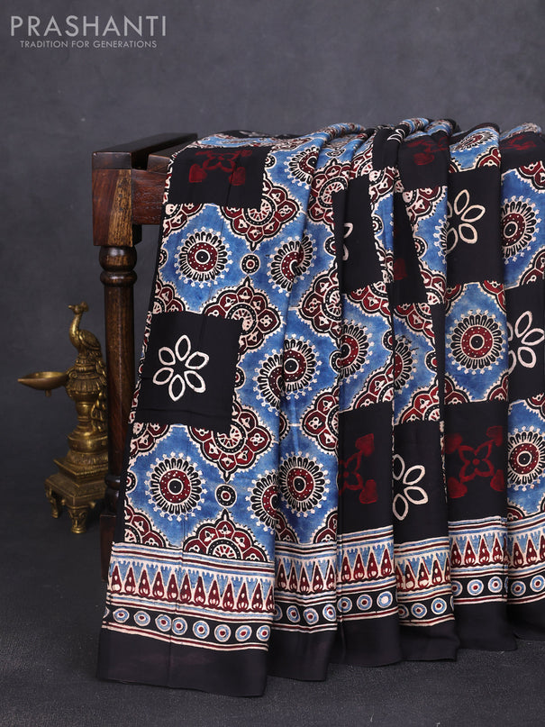 Modal silk saree black and maroon with allover ajrak prints and zari woven pallu