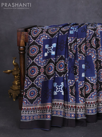 Modal silk saree indigo blue and black with allover ajrak prints and zari woven pallu