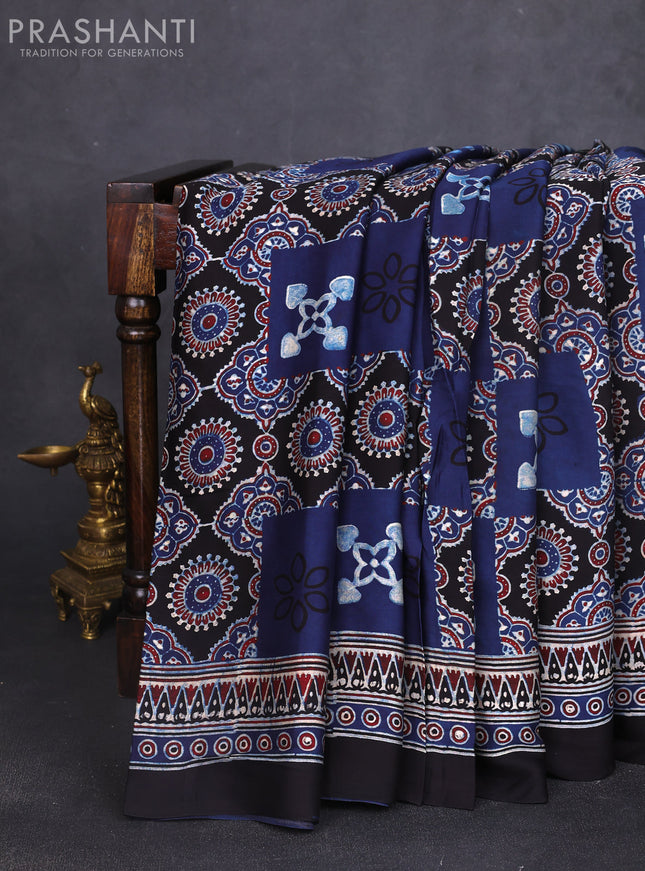 Modal silk saree indigo blue and black with allover ajrak prints and zari woven pallu