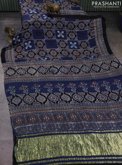 Modal silk saree indigo blue and black with allover ajrak prints and zari woven pallu