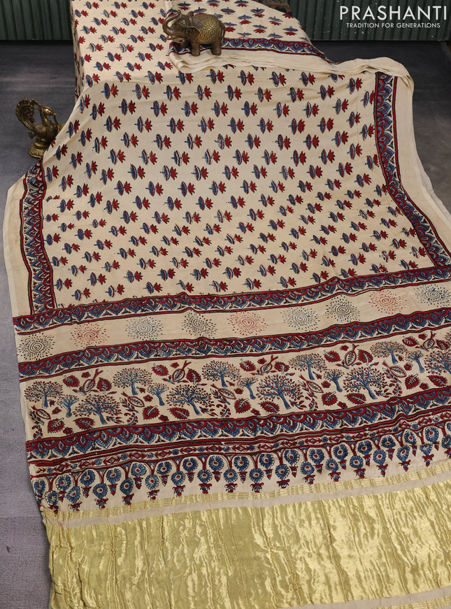 Modal silk saree cream and maroon with allover ajrak butta prints and zari woven pallu