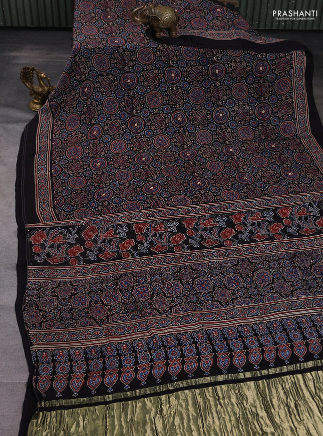 Modal silk saree black with allover ajrak prints and zari woven pallu