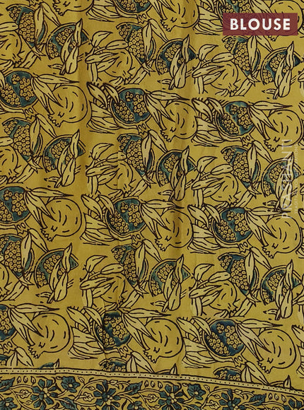 Modal silk saree yellow and mehendi green with allover ajrak prints and zari woven pallu