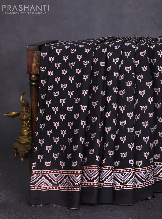 Modal silk saree black with allover ajrak butta prints and zari woven pallu