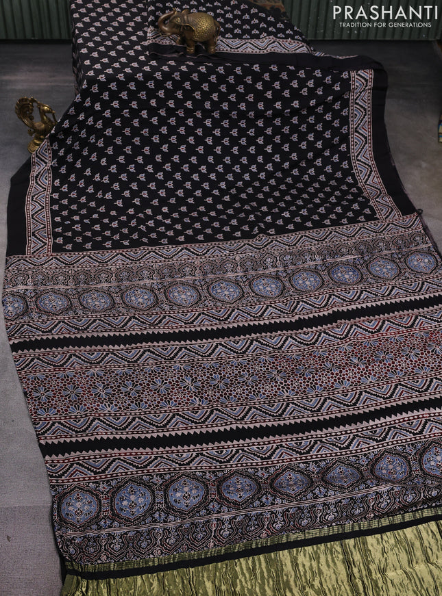 Modal silk saree black with allover ajrak butta prints and zari woven pallu