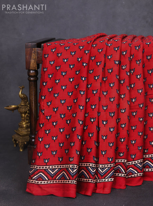 Modal silk saree maroon and pastel blue with allover ajrak butta prints and zari woven pallu